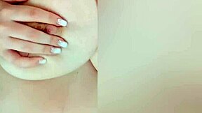 busty beauty teases her big nipples on camera while parents sleep nearby