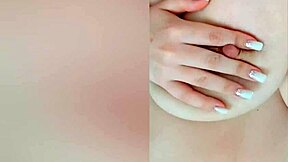 busty beauty teases her big nipples on camera while parents sleep nearby