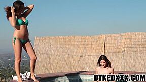 Wanna see two charming teen 18+s in steamy poolside lesbian play?