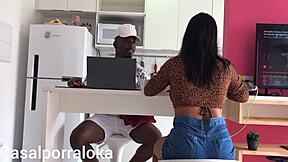 Esposa Safada Teases Husband in Kitchen During Chat