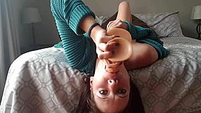 She gagged on a dildo upside down for an extreme deepthroat. It was sloppy and intense.