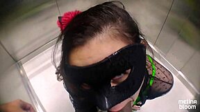 Melina Bloom Dressed In Green Gives Blowjob In Hotel Elevator
