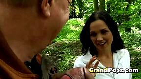 Petite hottie loves getting banged by old men in group outdoor fun!