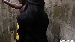 girls living in an uncompleted building, naked and interacting with passersby in the bush.