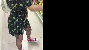 Milly walks with vibrator in shopping