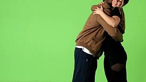 A young blonde teen engages in a hardcore activity with a huge black partner in doggystyle