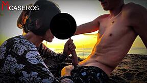 Stranger sucks cock on beach.