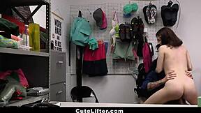 The Loss Prevention Officer Processes The Suspected Thief At The Shop