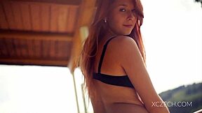 amazing teen is playing with her legs in a solo session