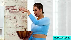 Busty Teen Masseuse Rubs Naked Body with Nuru Gel on Evan Stone