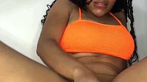 young latina masturbates with dildo, her wet pussy dripping