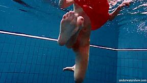 Sexy Naked Avenna Swims Nude in Pool Showing Tight Twat.