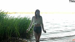 teen redhead mia reaches intense orgasm by the lake in solo play