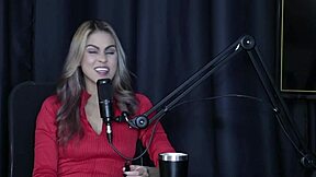 Sofie Lollipop teases with sheer red lingerie, kisses presenter, and shows blowjob skills in group fun 😏