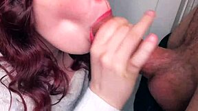 Watch the plump brunette give a tight blowjob on the balcony