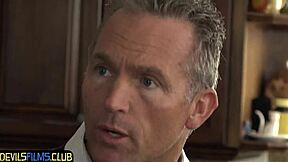 Stunning black teen with tattoo rides hard cock doggystyle in steamy kitchen scene.