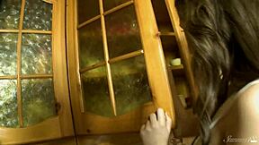 Pauline is getting frisky with that oily dildo, fingering her shaved pussy!