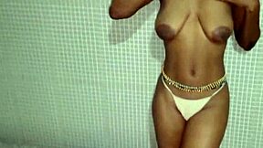 Her petite ebony body trembles from clit stimulation in homemade clip