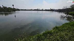 Can you give me a handjob and blowjob by the lake for a reward?