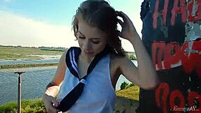 Spunky teen model strips bare in a daring outdoor miniskirt tease. What’s her next move?