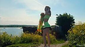 Spunky teen model strips bare in a daring outdoor miniskirt tease. What’s her next move?