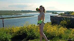 Spunky teen model strips bare in a daring outdoor miniskirt tease. What’s her next move?