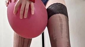 Damn! Sexy Balloons Mistress Elza Kom Dominates with Panty Sniffing Action!