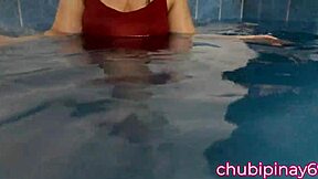Chubby mommy flashes her natural tits in the public swimming pool, exposing her sexy pussy to onlookers