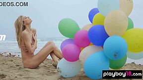 Skinny Italian MILF Plays With Balloons On Beach?