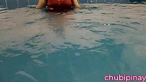 Chubby mommy flashes her natural tits in the public swimming pool, exposing her sexy pussy to onlookers