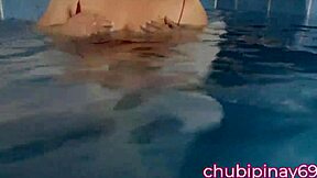 Chubby mommy flashes her natural tits in the public swimming pool, exposing her sexy pussy to onlookers