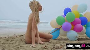 Skinny Italian MILF Plays With Balloons On Beach?