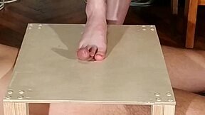 Hungarian domina stomps cock with bare feet in HD.