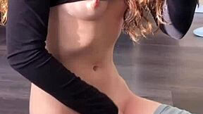 watch this petite slut finger her shaved pussy in front of the mirror, so horny and tight