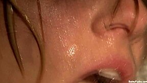 Dahlia Sky enjoys naughty solo masturbation in the shower, showing tits and ass.