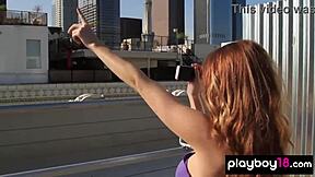 Bombastic busty redhead teen 18+ strips naked on rooftop
