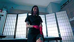 Sexy nurse in latex gloves aids patient with cum collection