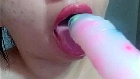 Watch this beautiful young girl teach you how to suck cock with her pretty lips.