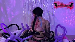emo girl plays hot with balloons?