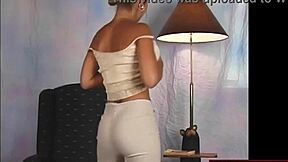 Big tits shake in beige dress while dancing