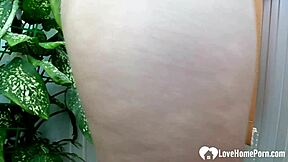 Brunette with small 18+ tits kneels for vibrator play—what’s her secret?