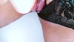 A cute latina babe engages in private activity in a public restroom, captured on hidden camera.