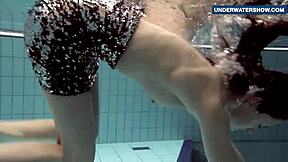 Bright tits flashing underwater turns everyone on