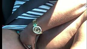 In this homemade scene, a young ebony girl with big tits does a striptease before some hardcore car sex