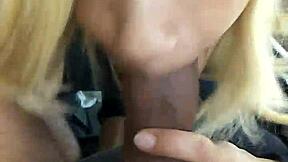 Sucking big black cock in car while talking to neighbor