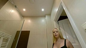 Hot petite blonde prepares in the bathroom for her lingerie casting