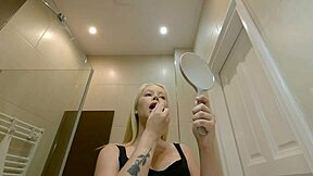 Hot petite blonde prepares in the bathroom for her lingerie casting