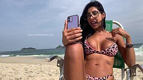 renatinha mello in a private live chat on the beach showing off