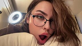 hot brunette with glasses, want to see her big ass facial?