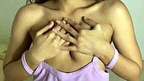 young stepsister explores with a big black dildo at home in homemade setting.